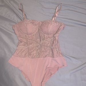 Baby rose colored Lacy bodysuit, built in bra